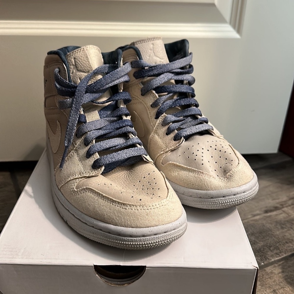 Beige High-Top Sneakers with Blue Laces